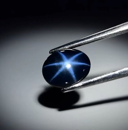 2.42 carat untreated star sapphire showing string asterism