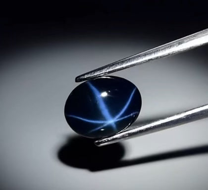 2.42 carat untreated star sapphire showing string asterism
