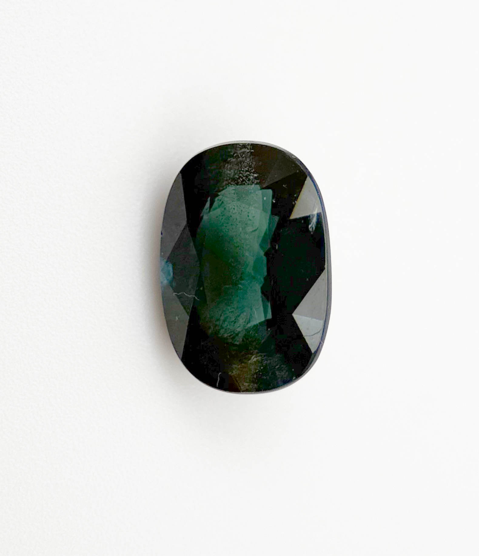 3.08 carat bluish-green sapphire, VS clarity, untreated and unheated